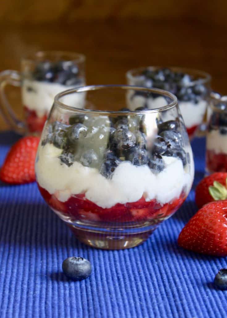 Layered trifle with strawberries and blueberries